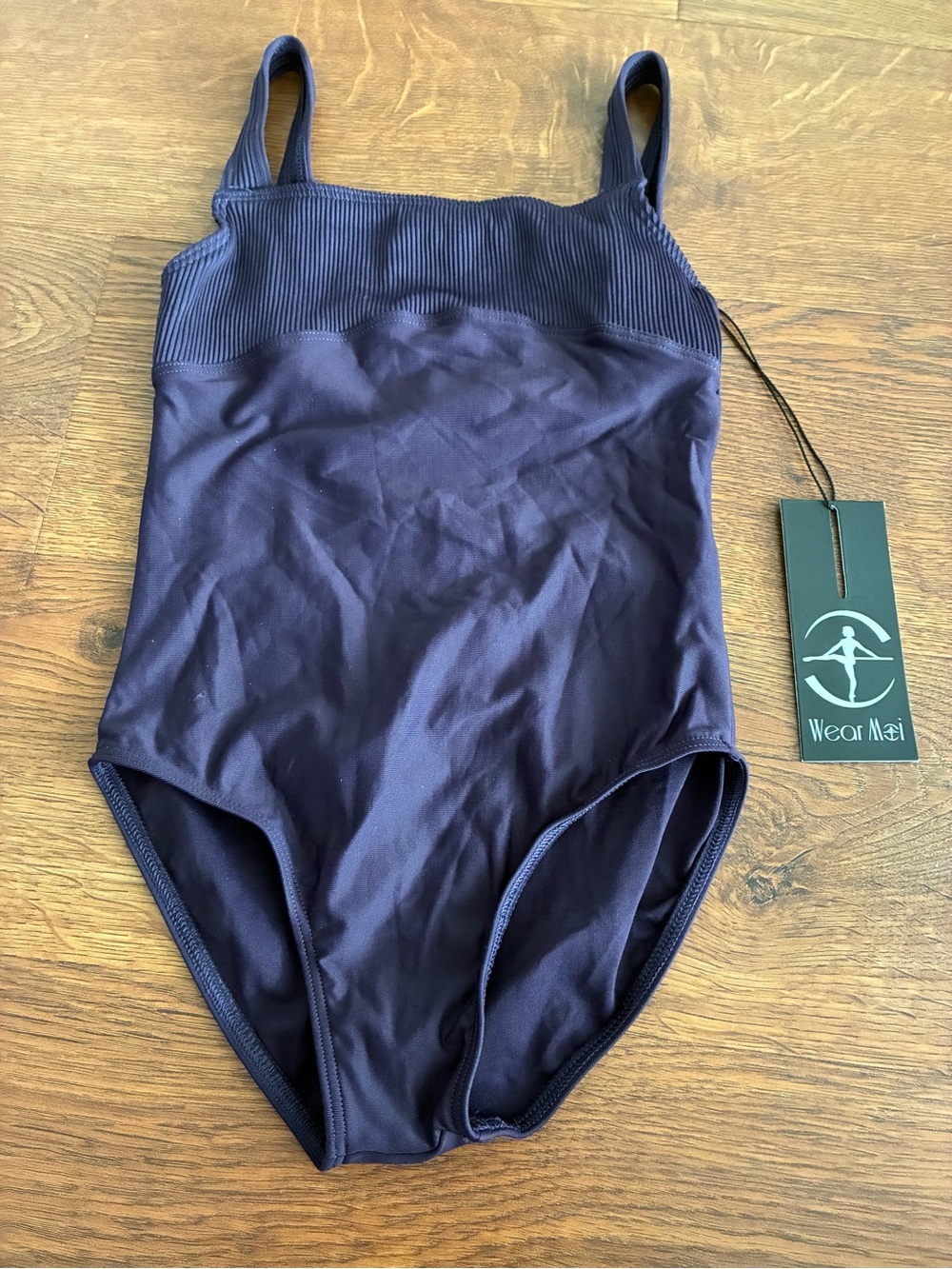 New with tag TITANIA by wear Moi kids size 8/10. Prune color